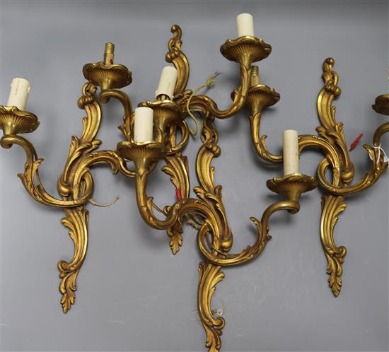 Two pairs of Louis XV style ormolu two branch sconces length 39.5cm